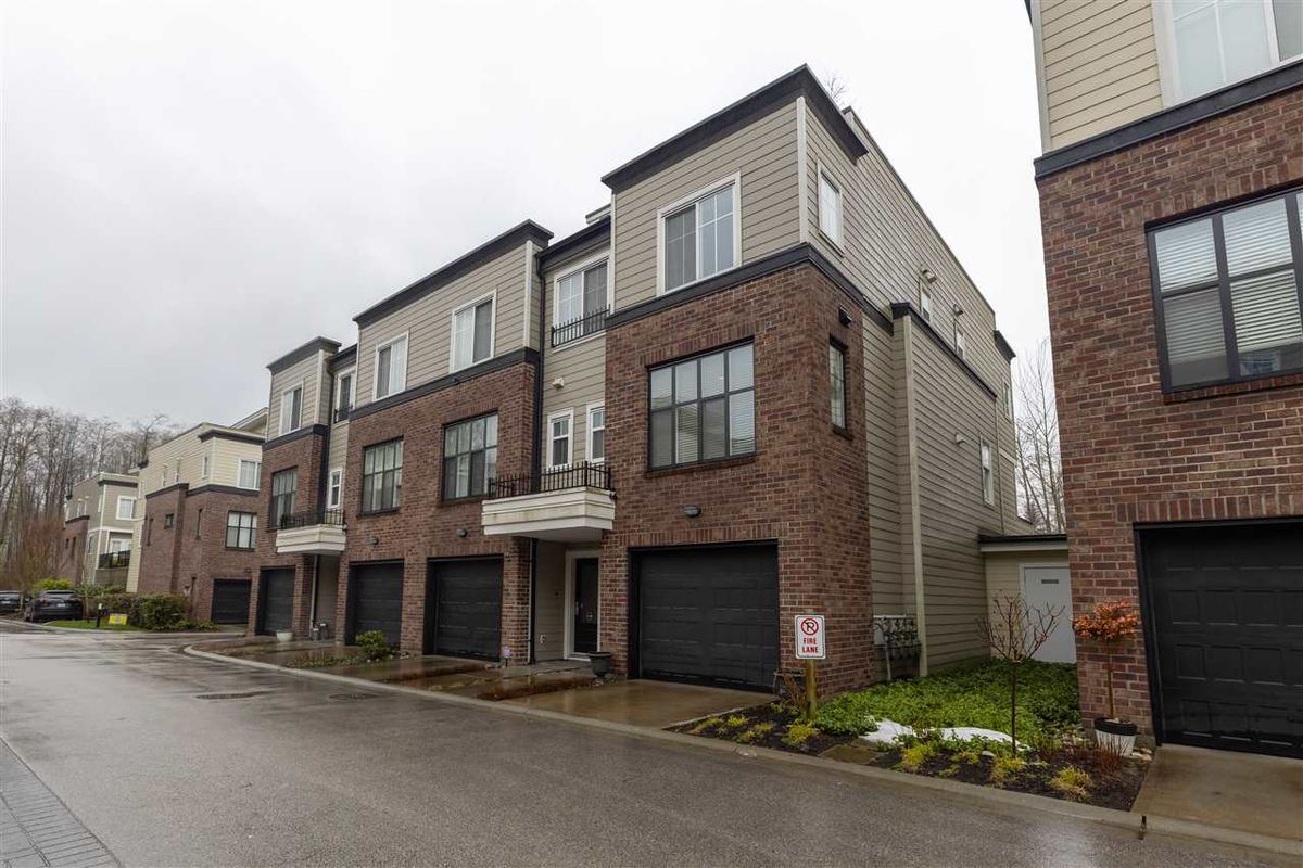 Brick and siding townhomes in Morgan Creek, South Surrey