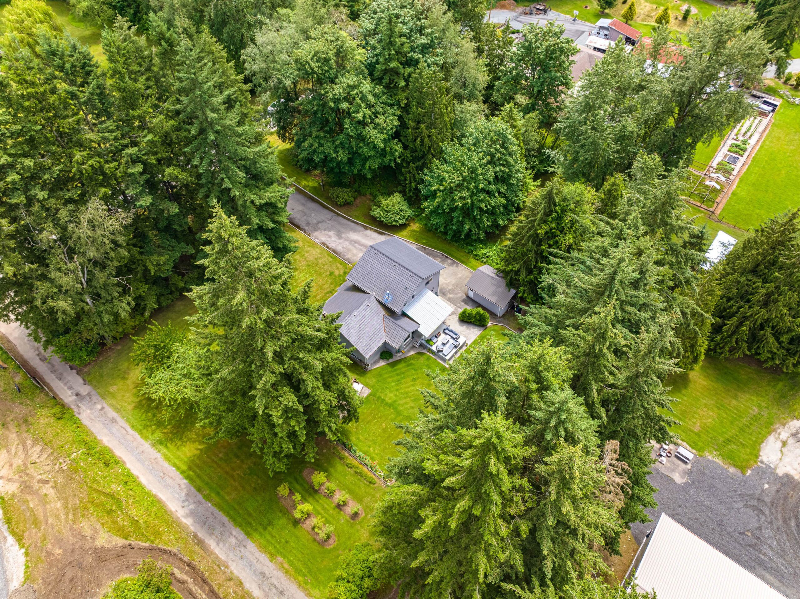 NEW LISTING! Discover a Private 5-Acre Retreat in South Langley with a Brand-New Shop