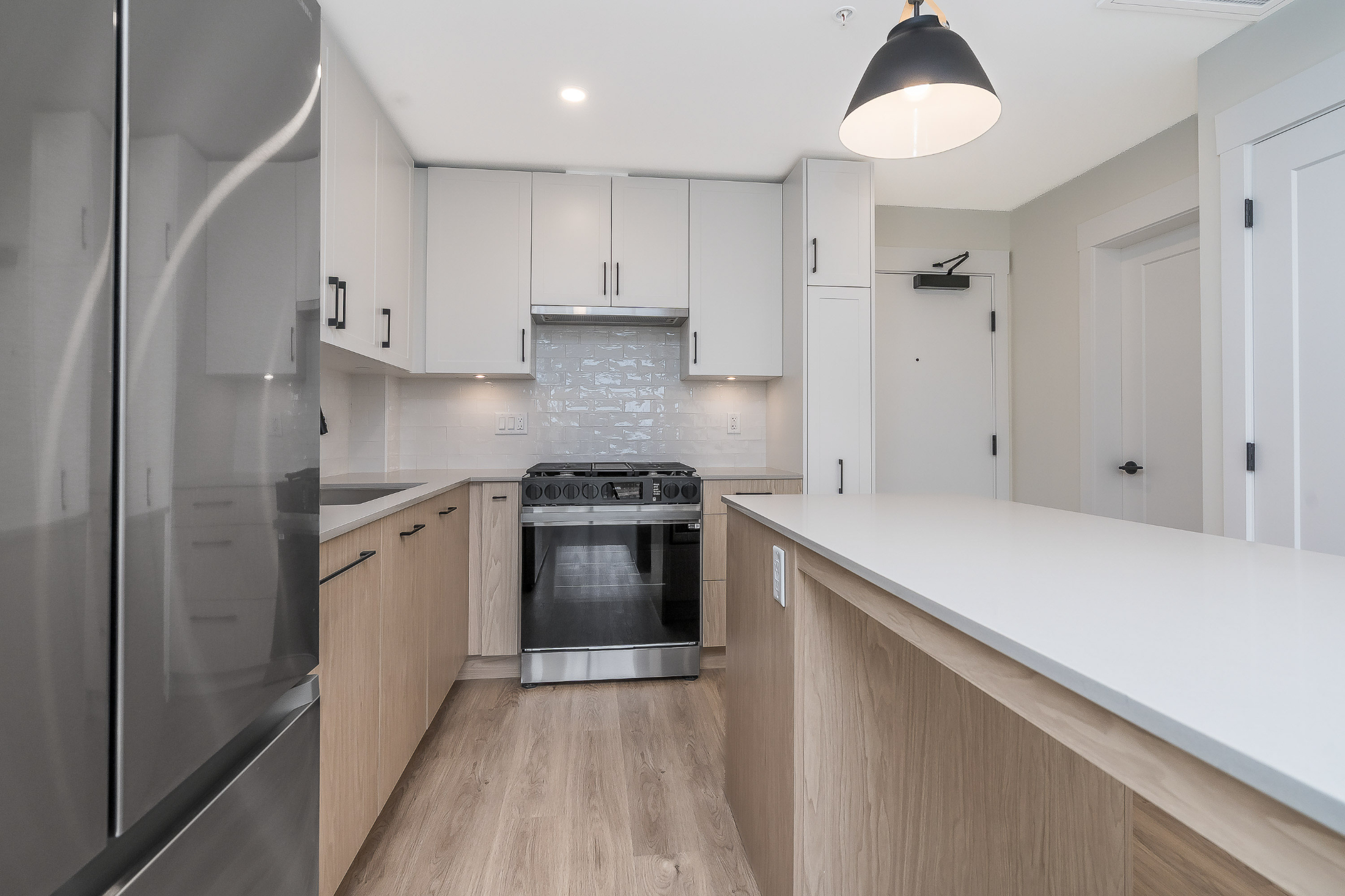 Modern interior living space at 401–27215 Aldergrove Town Centre Drive