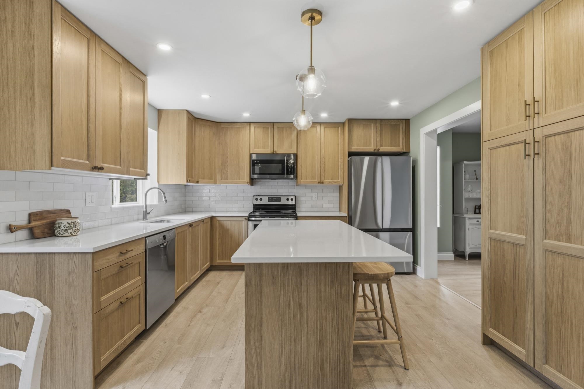Sold home at 23623 Tamarack Lane in the Albion neighbourhood of Maple Ridge, BC.